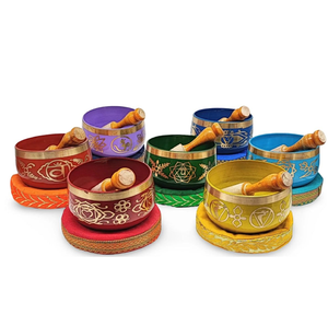 Seven chakra colored brass Tibetan singing bowl set with wooden strikers, available at wholesale prices. - Product Image 1