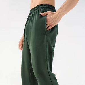 Pantalon de survêtement en coton vert foncé pour homme, taille mi-haute, avec cordon de serrage, décontracté, avec poches, coupe classique, pour l'automne - Product Image 1