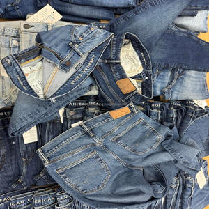 Vêtements en gros en stock, jeans pour hommes avec décoration boutonnée, patchwork, coupe slim, jeans en denim déchirés pour hommes, pantalon en stock - Product Image 1