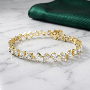 Pulsera de tenis chapada en oro de 18k con 10.050 CTW de diamantes cultivados en laboratorio de formas mixtas, unisex, certificada por OBERON JEWELS - Product Image 1
