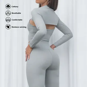 Ensemble de sport unisexe respirant et épais noir, comprenant un crop top sans manches sans couture à col ras du cou avec lettrage et un legging taille haute ajusté - Product Image 2