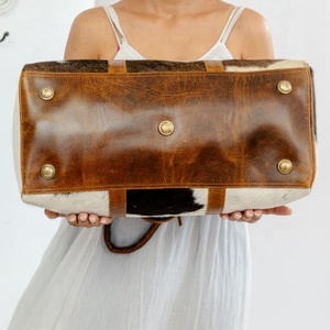 กระเป๋าเดินทางหนังวัววินเทจสำหรับผู้ชายและผู้หญิง - Product Image 4