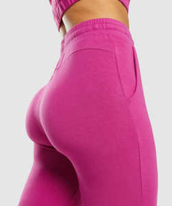 Pantalones de chándal de invierno de alta calidad al por mayor para mujer, de forro polar, cintura alta, ajuste regular, con aberturas laterales, estilo streetwear y fitness - Product Image 5