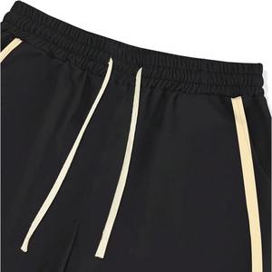 Pantalon de survêtement unisexe tendance rétro étoilé |   Bandes contrastées noires et beiges |   Sweatpants en molleton 100% coton personnalisés - Product Image 2