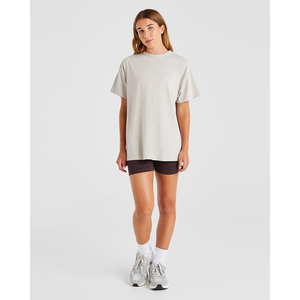 Camiseta de Verano 2026 para Mujer, Corte Holgado, Cuello Redondo, Manga Corta, Color Sólido, Algodón, Informal, para Uso Diario, Largo por Encima de la Rodilla, Transpirable - Product Image 1