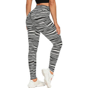 เลกกิ้งขายส่งแบรนด์ดังสำหรับฤดูร้อน เอวกลาง ไร้ตะเข็บ พิมพ์ลายแบบซับลิเมชั่น สำหรับผู้หญิง คุณภาพสูง ระบายอากาศได้ดี เหมาะสำหรับโยคะ ฟิตเนส แฟชั่นลำลอง - Product Image 4