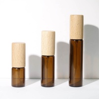 Flacon de parfum rond vide en verre ambré transparent avec atomiseur et bouchon en bois véritable (bois de hêtre, noyer) – 5 ml, 10 ml, 15 ml, 20 ml