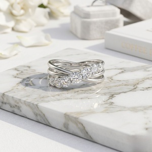 Anillo cruzado de siete piedras con engaste de puntas y corte redondo de 1.00 quilates - Product Image 1