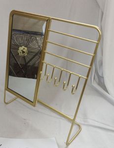 Soporte de joyería de metal dorado con espejo y ganchos para decoración de baño - Product Image 1