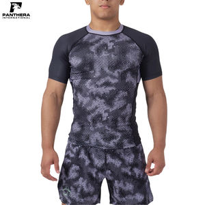 เสื้อรัดกล้ามเนื้อ MMA คุณภาพสูง สำหรับฝึกซ้อมแบบ No Gi พิมพ์โลโก้ได้ตามต้องการ ผลิตจากผ้าสแปนเด็กซ์/โพลีเอสเตอร์ แขนสั้น ระบายอากาศได้ดี - Product Image 4