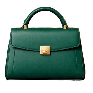 Este artículo es un bolso de mano estructurado de color verde con cierre de broche dorado y acabado similar al cuero. - Product Image 1