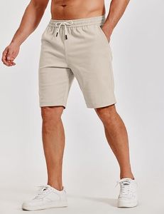 Shorts de golf décontractés pour hommes en polyester respirant de qualité supérieure avec logo sur le devant et fermeture à boutons, extensibles pour l'été - Product Image 1