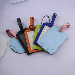 Produits phares : Étiquettes de bagages de voyage rondes en cuir véritable, de haute qualité, personnalisables avec logo, élégantes et durables - Product Image 1