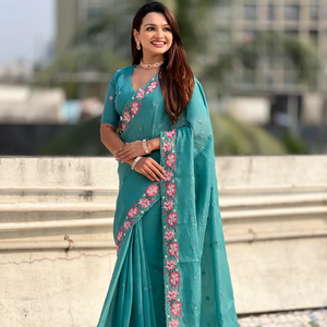 ผ้าไหมครัชสีฟ้าอมเขียวลายดอกไม้หลากสี ปักลายดีไซเนอร์ น้ำหนัก 490 กรัม สำหรับชุดราตรี - Product Image 1