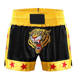 Shorts de boxe personnalisés pour hommes, jaunes, en satin, avec broderie main du logo du tigre sur le devant, coupe classique, pour adultes, vêtements de combat MMA - Product Image 1