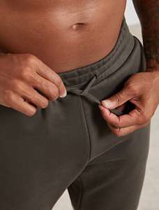 กางเกงออกกำลังกายผู้ชายขายดี ผ้าไนลอนระบายอากาศ ยืดหยุ่น ทรงเข้ารูป มีกระเป๋าซิป น้ำหนักเบา เหมาะสำหรับวิ่งและออกกำลังกายในฤดูใบไม้ผลิ - Product Image 4