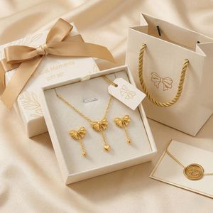 New Trendy Stainless Steel <b>Bow</b> Earrings and Necklace Set with Custom Packaging - Product Image 1