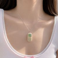 Collier pendentif téléphone rétro Y2K avec écran pixel mignon, bijou téléphone portable vintage pour femme et fille, idée cadeau