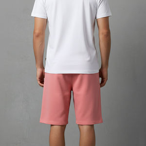 กางเกงขาสั้นเบอร์มิวด้าสีชมพูสำหรับผู้ชาย เอวกลาง ซิปหน้า สวมใส่สบาย ผ้าไนลอน/สแปนเด็กซ์ แห้งเร็ว ระบายอากาศได้ดี มีกระเป๋า - Product Image 3