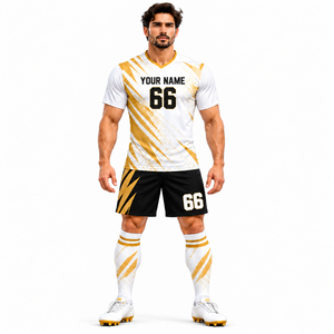 Diseño contemporáneo de uniforme de fútbol blanco con detalles dorados y pantalones cortos negros para ropa deportiva de equipo - Product Image 1