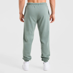 Pantalones deportivos de felpa de alta calidad, sostenibles, al por mayor, para hombre, de corte holgado, con cintura elástica, bolsillos y secado rápido. - Product Image 2
