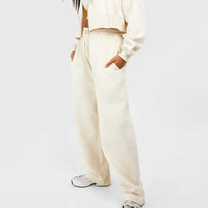 กางเกงวอร์มเอวยางยืดสีครีมอ่อนดีไซน์ใหม่สำหรับผู้หญิง ผ้าฝ้าย 100% ลายเรียบ สไตล์แบ็กกี้ สำหรับฤดูหนาว - Product Image 1