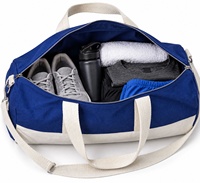 Sac de sport cylindrique en toile avec fermeture éclair et bandoulière réglable