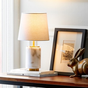 Modern Marble Accent Lamp Featuring Elegant Cylinder Silhouette Refined Metal Detailing And Warm Atmospheric <b>Illumination</b> - Product Image 3