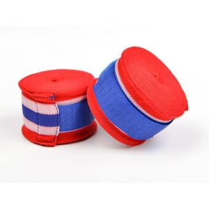 Venta al por mayor Muay Thai boxeo mano envuelve 2,5 m/3m logotipo personalizado impresión ecológico transpirable algodón muñequera protección vendaje - Product Image 1