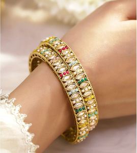 Brazaletes vintage de aleación chapados en oro con incrustaciones de cristal de imitación y perlas para mujeres, joyería de boda. - Product Image 1