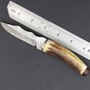 Cuchillos de caza de alta resistencia con estructura completa y escamas texturizadas para un manejo estable en condiciones exteriores exigentes. - Product Image 6