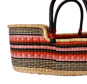 Original multi-stripe and black patterned seagrass changing <b>basket</b> alongside rattan changing kid <b>basket</b> featuring black <b>handles</b> - Product Image 4