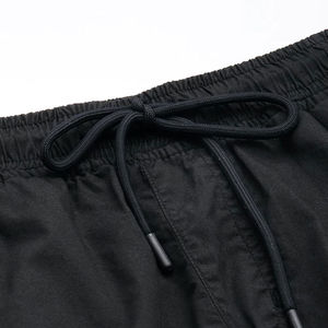 Pantalon de jogging en coton pour hommes, taille haute, multi-poches, avec cordon de serrage, coupe droite oversize, couleur foncée, style tendance, vente en gros - Product Image 4