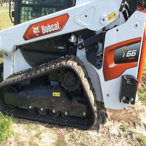 รถแทรกเตอร์ขนาดเล็ก T66 มือสองคุณภาพพรีเมียม เครื่องยนต์ Bobcat ผ่านการตรวจสอบอย่างมืออาชีพเพื่อการใช้งานที่ราบรื่น - Product Image 4