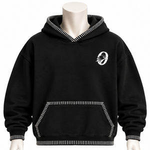 Sweat à capuche oversize noir avec bordure cousue, effet vieilli, style streetwear, surpiqûres contrastées, poche kangourou, tenue décontractée - Product Image 1