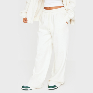 Pantalones deportivos anchos color marfil para mujer, joggers personalizados de poliéster y algodón, joggers holgados de calidad premium OEM para mujer - Product Image 1