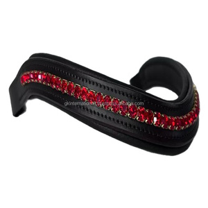 Diadema para caballo de cuero acolchado suave con diseño de onda y canal vacío, con incrustaciones de cristales rojos, Mega Bling, para doma. - Product Image 1