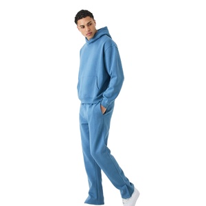Ensemble de survêtement 2 pièces pour homme avec logo personnalisé, comprenant un sweat à capuche en molleton bleu acier et un pantalon de survêtement à jambes larges avec fentes latérales, fabriqué au Pakistan - Product Image 1
