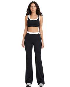Ensemble de sport personnalisé pour femme : soutien-gorge contrastant noir et blanc et pantalon évasé taille haute extensible pour yoga, fitness et gym – Vente en gros OEM personnalisée - Product Image 1