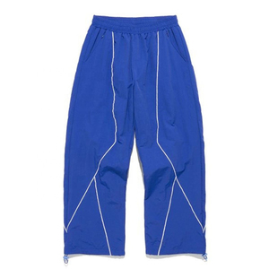 Pantalon de survêtement unisexe personnalisé en nylon, style athlétique avec passepoil, coupe large et ajustable, streetwear pour homme - Product Image 6
