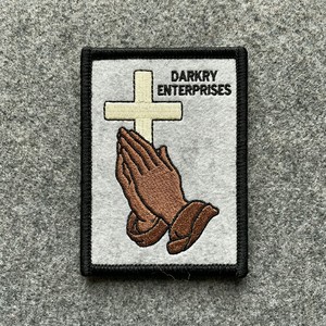 Custom Machine Embroidered Iron On Cross Patch religious symbol with golden rays <b>light</b> blue background black border for garments - Product Image 3