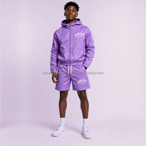 Conjunto cortavientos personalizado, traje deportivo cortavientos de 2 piezas, talla estándar, conjunto de 2 piezas, chaqueta de nailon con bloques de color, conjunto cortavientos morado - Product Image 1
