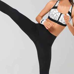 เสื้อชั้นในกีฬาแบบดันทรงสำหรับผู้หญิง ไซส์ผู้ใหญ่ รองรับแรงกระแทกสูง เหมาะสำหรับโยคะและฟิตเนส มีโลโก้ด้านหน้า แห้งเร็ว ระบายอากาศได้ดี ดีไซน์แบบ Racerback - Product Image 4