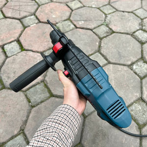 Martillo perforador rotatorio profesional GBH 220 con tecnología SDS-plus, solución compacta ideal para principiantes en perforación y taladrado. - Product Image 4