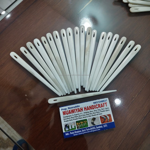 Aiguilles à coudre et à tisser en os de buffle de bonne qualité. Les aiguilles présentent un grand chas et une finition blanche polie au meilleur prix. - Product Image 5