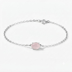 Rhaya Jewels Pulsera de eslabones de plata de ley chapada en rodio con cuarzo rosa de corte ovalado clásico solitario y engaste de puntas - Product Image 1