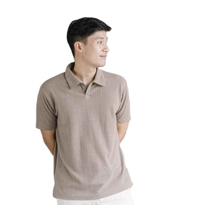 เสื้อโปโลผู้ชายผ้าวาฟเฟิลคุณภาพพรีเมียม แห้งเร็ว สีพื้น โลโก้ด้านหน้า ใส่สบาย สไตล์ลำลอง - Product Image 2