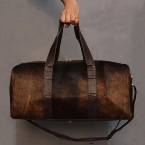 Fully Customized Cowhide Genuine Leather Duffle <b>bags</b> Low Price Heavy Duty Solid Color Cowhide Duffle <b>bags</b> For <b>Men</b> - Product Image 1