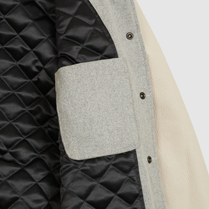 Veste varsity grise pour homme avec manches en cuir crème, col rabattu, fermeture boutonnée, style preppy, vêtement d'automne - Product Image 4