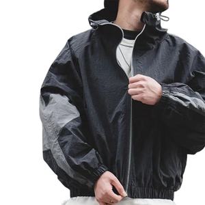 เสื้อแจ็คเก็ตกันลมแบบมีฮู้ดน้ำหนักเบาบางเบาสำหรับฤดูหนาว ตกแต่งด้วยผ้าแบบแพทช์เวิร์ค พร้อมกางเกงวอร์มเอวยางยืดมีซิป ดีไซน์ทันสมัยสำหรับการออกกำลังกายและสวมใส่สบายๆ - Product Image 1